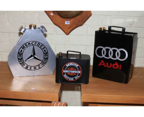 Three advert fuel cans, Mercedes Benz, Harley Davidson and Audi.