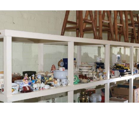 Full shelf of assorted china including candle snuffers, figurines, dinnerwares, Ringtons, assorted mugs, etc.