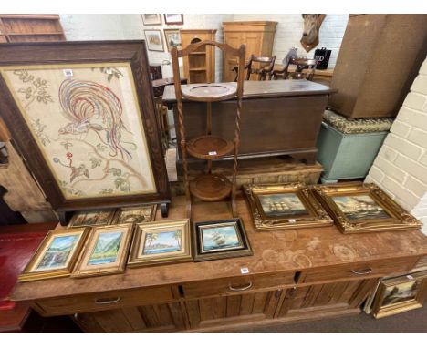 Collection of eighteen various pictures including oils, needlework panel firescreen and three tier oak cakestand.