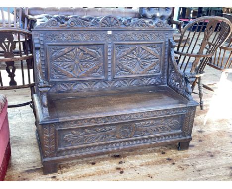 Victorian carved oak box hall bench, 101cm by 121cm.