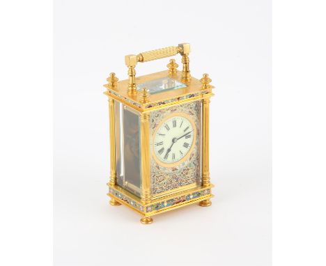 French enamelled and polished brass timepiece carriage clock, the case with four finials and column supports, on bun feet, de