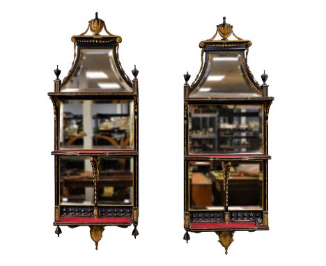 Pair of ebonised and gilt gesso wall shelves, late 19th Century, with urn finial cresting, above three shelves with beading e