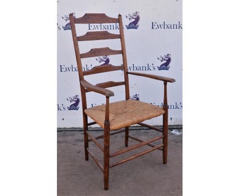 An ash ladder back armchair, late 19th/20th Century, 115cm high