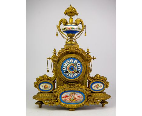 French spelter and Sevres style porcelain mantel clock, 19th Century, the case with urn finial and swag mounts, the porcelain