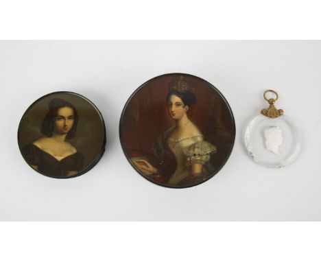 A Stobwasser papier mache circular box, painted to the cover with a portrait of Victoria, Queen of Great Britain, titled to t
