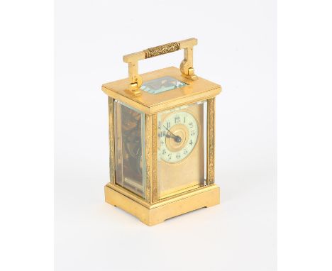 French brass carriage clock, the case engraved with bands of bees and flowers, the handle with conforming decoration, the whi
