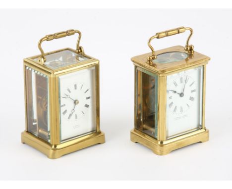 Brass carriage clock, of typical form, with white enamel dial with Roman numeral chapter ring, with the retailers name, E. Do