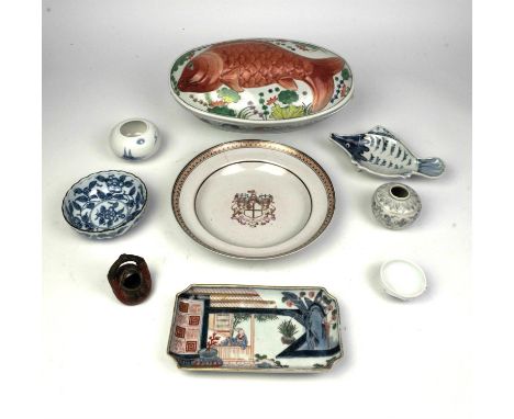 A famille rose armorial shallow soup dish with central arms of The East India Company above the motto 'Auspicio Regis et Sena