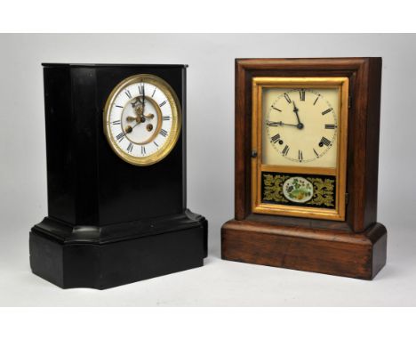 Black slate mantle clock the two train movement with visible escapement, striking the hours and half hours on a bell, 38cm x 