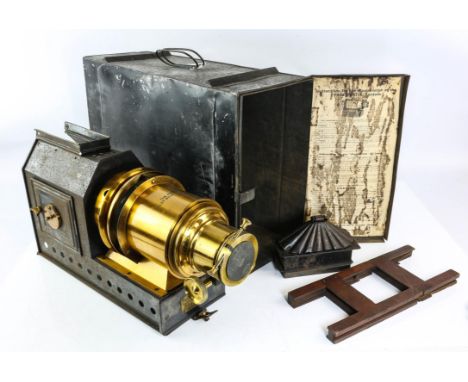 Riley Brothers Ltd "The Praestantia" magic lantern with original tin transit box, and a large quantity of glass slides, mainl