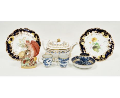 Pair of mid-19th century English porcelain botanical blue ground cabinet plates, a Staffordshire pottery model of a squirrel 