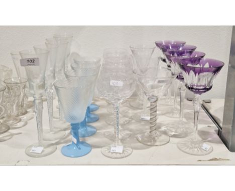 Collection of drinking glasses&nbsp;including a set of four purple overlay stemmed wine glasses, 19.5cm high, a set of five c