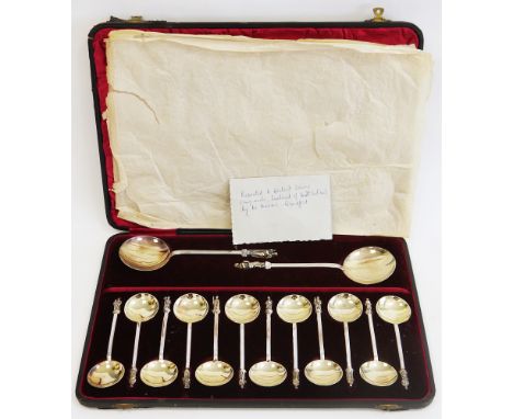 Late 19th/early 20th century cased silver plate apostle spoon set, comprising two serving spoons, 21cm long and 12 tablespoon