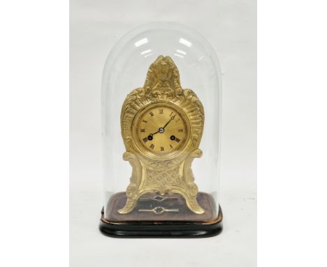 Late 19th/early 20th century French gilt metal mantel clock&nbsp;in the rococo style, the gilt face with roman numerals and t