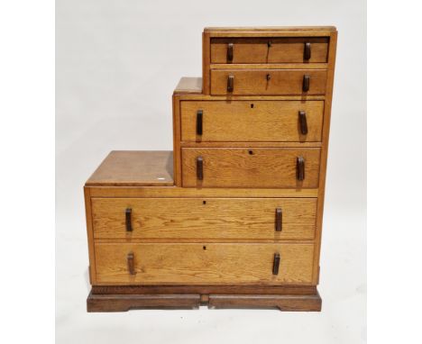Art Deco oak chest of drawers&nbsp;of stepped construction, comprising three pairs of drawers with moulded loop handles, on s