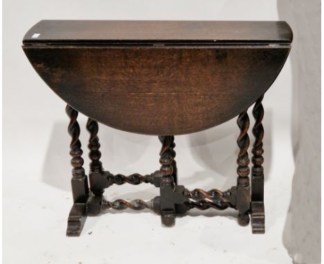 Early 20th century oak oval gateleg table on barleytwist and block supports, 70cm high x 80cm long x 83cm wide&nbsp;