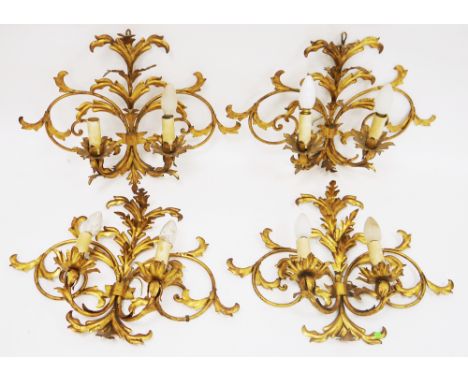 Set of four gilt metal two-branch wall lights&nbsp;in the foliate scrolling rococo style, 34c In that not not now but they do