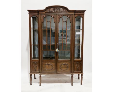 Early 20th century Sheraton Revival mahogany display cabinet&nbsp;of breakfront form with moulded arched top over two central