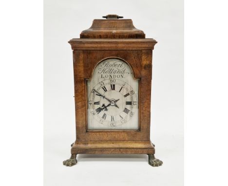 George II-style walnut bracket clock, the case with ogee caddy top and brass swing handle, glass panels to sides and back, on