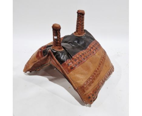 Middle Eastern multi-coloured leather camel saddle with two holding poles, 55cm high x 79cm wide x 50cm deep&nbsp;