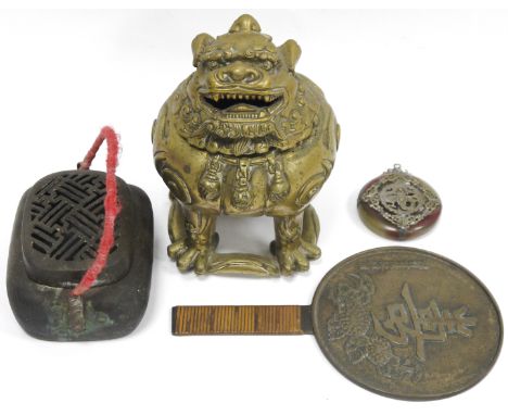 Chinese gilt-bronze incense burner in the form of a stylised mythical beast, with hinged head cover and metal liner, on claw 