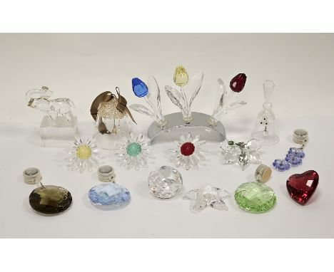 Collection of Swarovski crystal glass ornaments including three tulips on stand, two bells, various paperweights and keyrings