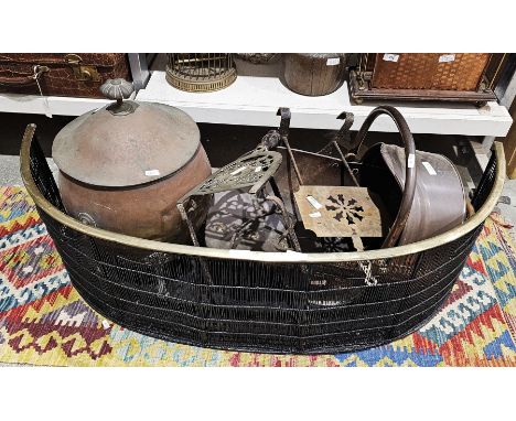 Collection of brass and copperware&nbsp;including two pierced kettle warming stands, a helmet coal scuttle, an urn-shaped pur