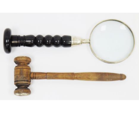 Hand held magnifying glass with horn bobbin turned handle, 29cm long together with a turned wooden gavel, 24cm long