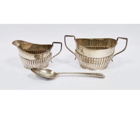 George V silver milk jug and sugar bowl, Chester 1910, Barker Brothers, with part fluted bodies, sugar bowl 7cm high, togethe