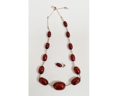 Mixed lot including cherry amber style bead necklace, comprising twelve graduating beads with yellow metal link spacing, larg