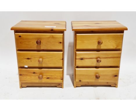 Pair of modern bedside chests of three drawers with pine knob handles, 59cm high x 45cm wide x 35cm deep (2)&nbsp;