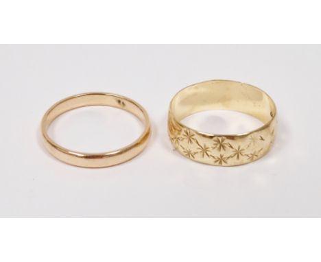 9ct yellow gold wedding band with star engraved decoration, size O, 2.6 grams together with an unmarked yellow metal plain we