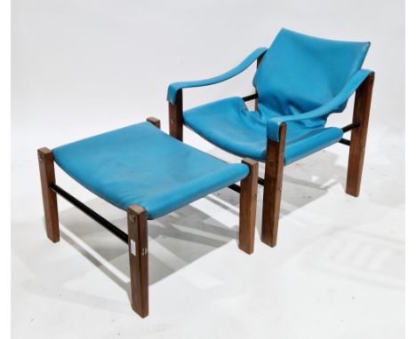 Maurice Burke for Arkana mid-20th century Safari chair and matching footstool upholstered in a blue leatherette, on a teak an