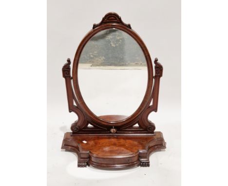 Victorian mahogany large swing mirror&nbsp;having an oval plate, on a shaped base with drawer, on carved scrolling feet, 95cm