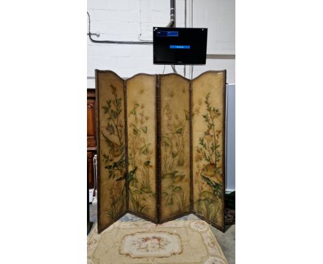 Early 20th century four-fold dressing screen, the arched studded leatherette panels painted with scenes of birds, insects, bu