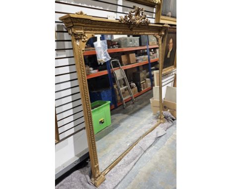 Large late 19th century French giltwood and gesso wall mirror, of rectangular form surmounted with a shell-shaped laurel and 
