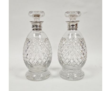 Pair of George V hobnail cut glass decanters with silver collars, Birmingham 1930, Hukin & Heath, with mushroom shaped stoppe