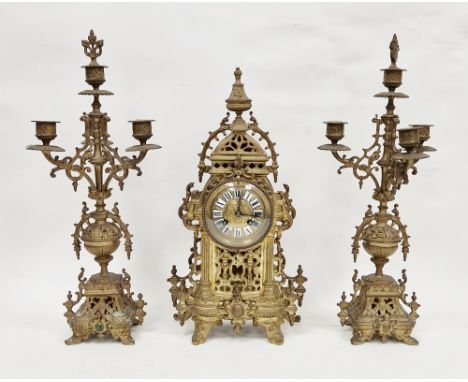 Early 20th century French gilt brass three-piece clock garniture, the bell striking clock with roman numerals on white enamel