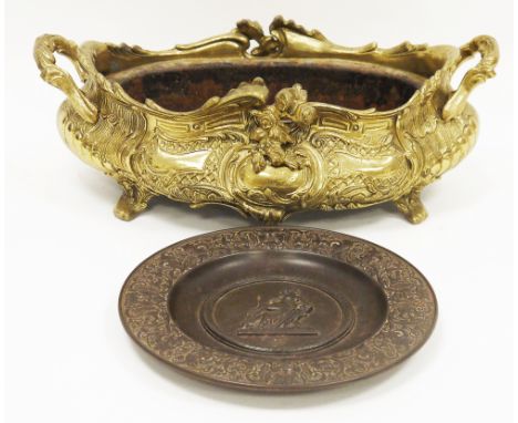 Art Nouveau style brass jardiniere or planter with metal liner, of oval form with twin handles, ornately cast including flowe