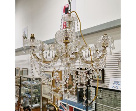 Gilt metal and cut glass six-branch electrolier with prismatic and tear shaped crystal drops and swags, 60cm high x 50cm diam