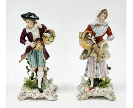Pair of German porcelain figures, late 19th century, underglaze blue cross marks, painter's numerals, modelled as a gallant h