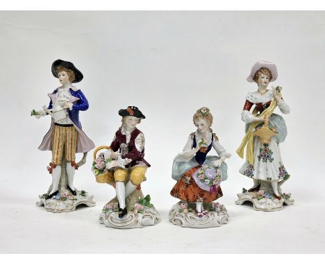 Two pairs of Sitzendorf porcelain figures, late 19th/early 20th century, printed blue crowned S marks, impressed numerals and