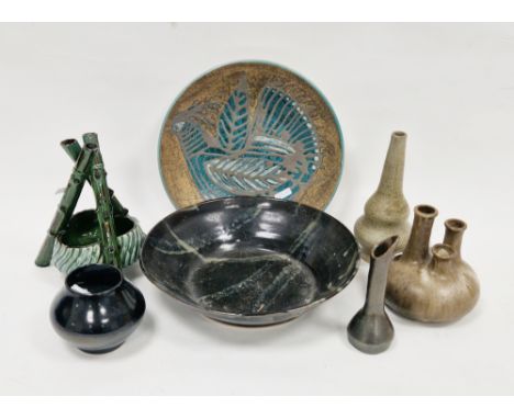 C.H. Brannam Barum pottery green-glazed dish, early 20th century, formed from three simulated bamboo poles supporting a spira