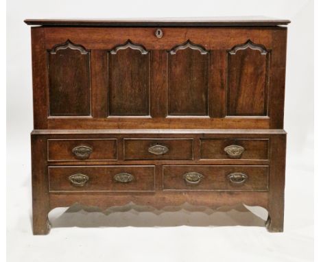 18th century oak mule chest, the hinged lid with thumbmould edge, the front with four moulded arched panels over three short 