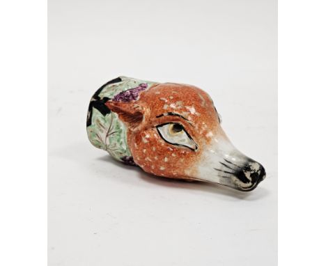 Staffordshire pottery fox-shaped stirrup cup, circa 1820, moulded with purple fruiting vine and fox head, naturalistically en