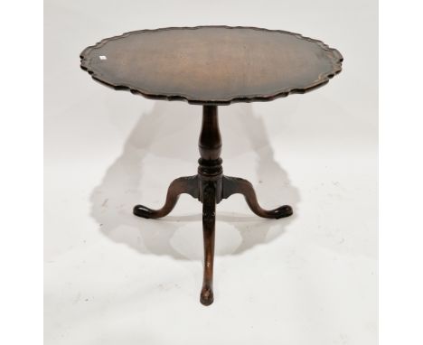 George III mahogany tilt top supper table, the circular top with moulded pie-crust edge, on a turned baluster support with th