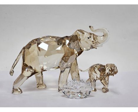 Two Swarovski crystal glass elephants&nbsp;including Cinta the elephant 1137207 with name plaque and companion young elephant