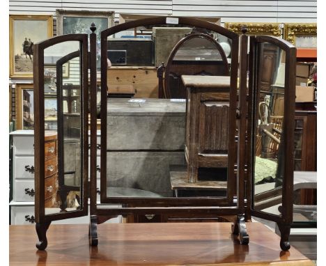 19th century triparte folding dressing table mirror, of arched rectangular form, with pinecone finials, on scroll feet, 66.5c