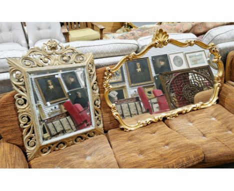 Modern gilt-framed overmantel mirror in the rococo-style, 90cm x 121cm,&nbsp;a modern wall mirror with scrolling carved frame