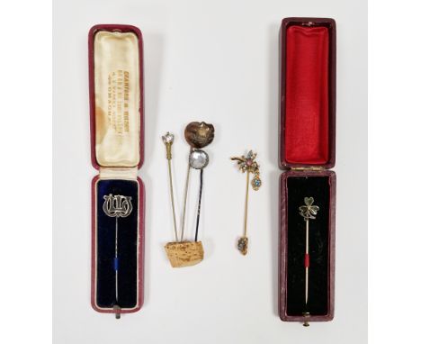 Six late 19th / early 20th century stickpins including a yellow metal pin having dragonfly finial set with turquoise and pear